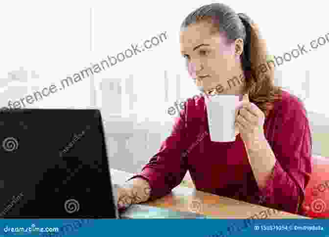 A Woman Working On A Laptop With A Coffee Cup On Her Desk SUMMARY: Reinventing You Define Your Brand Imagine Your Future By Dorie Clark